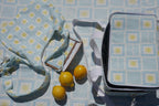 Blue ZAZZA Picnic collection: tote bag, cooler bag and picnic blanket styled with lemons 