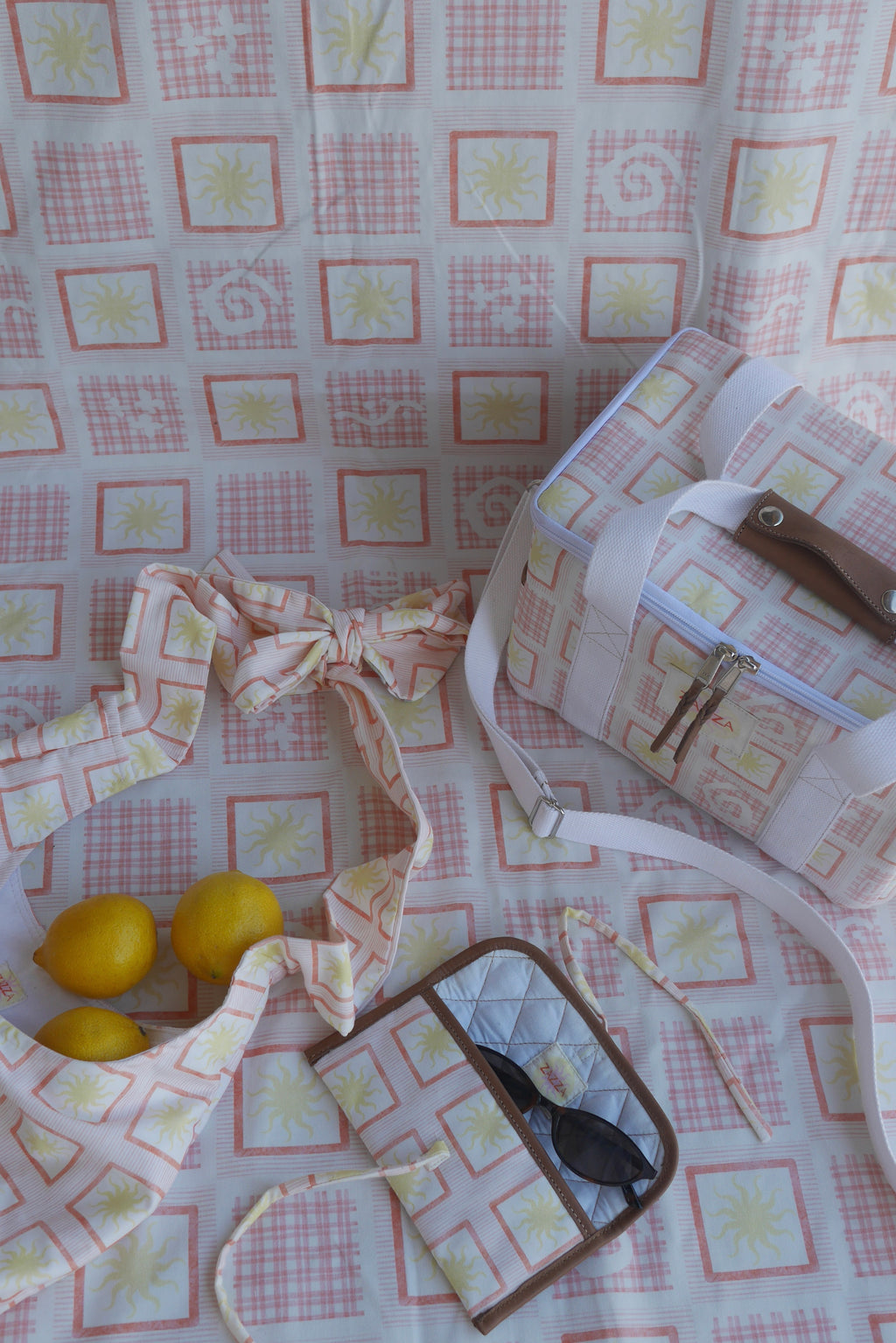 Styled image of ZAZZA red picnic collection. 